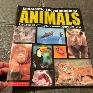 Scholastic and encyclopedia of animals by Lawrence Pringle. Children’s book.